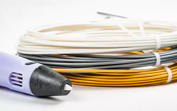 3d printing pen lie on three colorful rolled wires 2025 01 29 07 38 46 utc 6807ac1508130